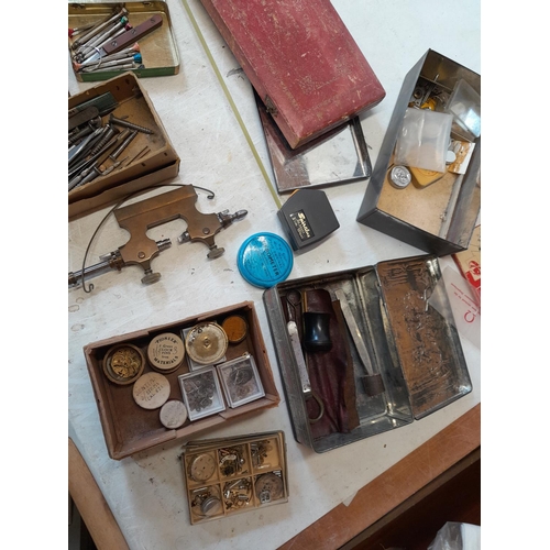 306 - assorted watch repair items and spares etc.