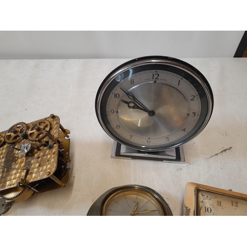 309 - Assorted clocks and clock movements for spares and repairs