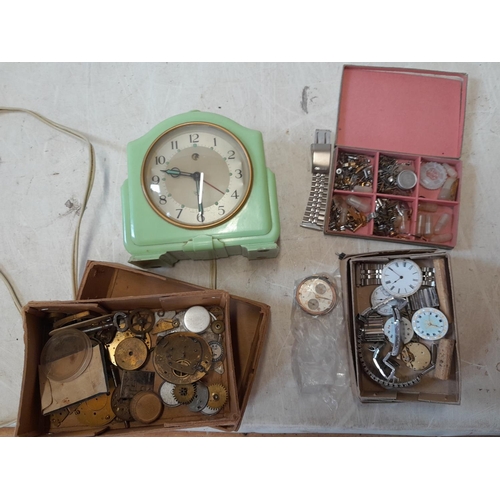 311 - Vintage green bakelite clock, springs, coils and dials etc. all spares and repairs