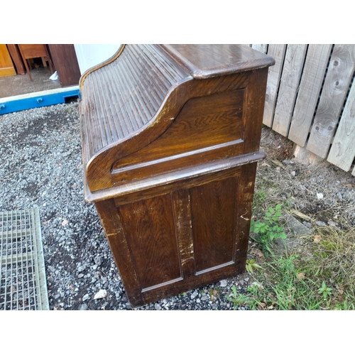 11 - Early 20th century oak single pedestal tabour top desk with fitted interior with key, single piece