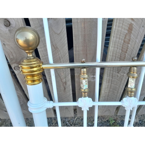 12 - Early 20th century bed knobs and broomsticks style cast iron bed with brass finials and mother of pe... 