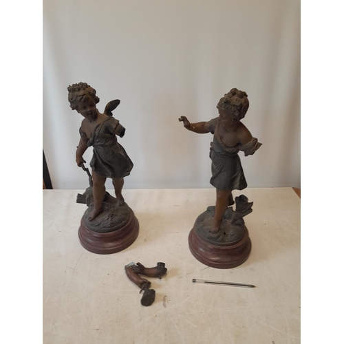 28 - Pair of late 19th century damaged spelter figures of cherubs