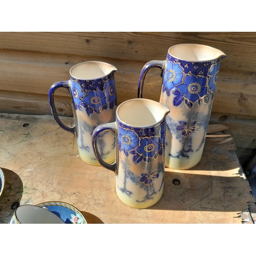 59 - Royal Doulton Suez pattern part tea set & 3 x Burleigh Ware Briar pattern graduated jugs, note handl... 