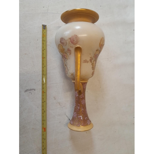 66 - Early 20th century Doulton gilded two handled vase in good order, little gild wear