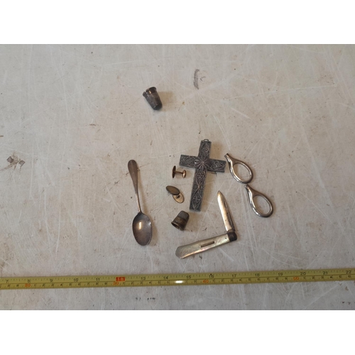 96 - Silver bladed fruit knife, silver thimble, silver filigree crucifix, silver teaspoon etc