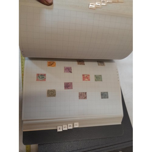 160 - Stamps of the world mounted in two alphabetically arranged folders