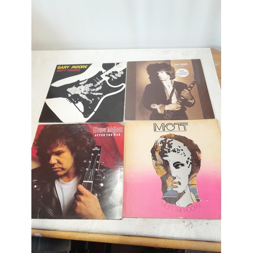 31 - 17 x vinyl record albums : Gary Moore, Moody Blues etc.