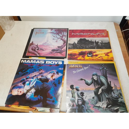 34 - 16 x vinyl record albums : Magnum, Magna Carta, Mahogany Rush (on import), Madam, Yngwie J Malmsteen