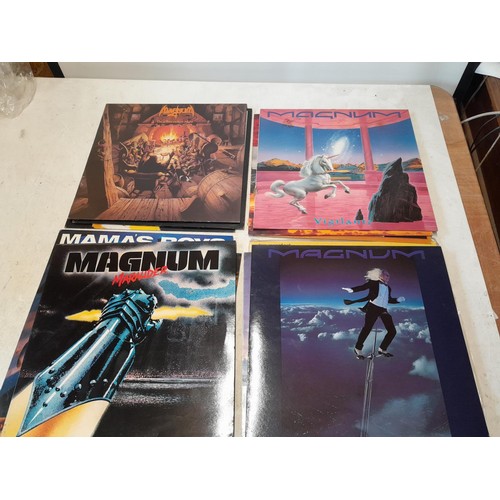 34 - 16 x vinyl record albums : Magnum, Magna Carta, Mahogany Rush (on import), Madam, Yngwie J Malmsteen