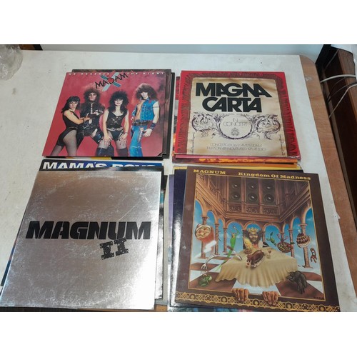 34 - 16 x vinyl record albums : Magnum, Magna Carta, Mahogany Rush (on import), Madam, Yngwie J Malmsteen