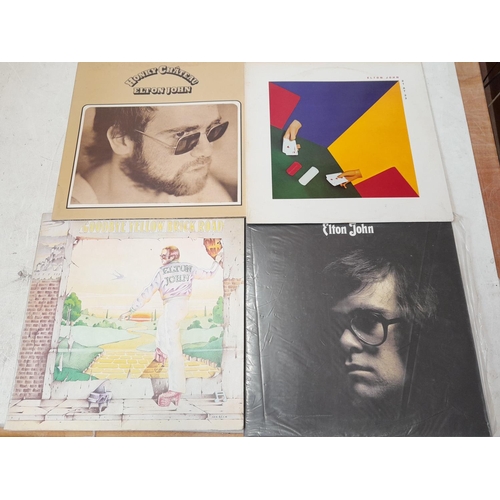 39 - 12 x vinyl record albums : Elton John, Jojo Gunne,  Hendrix etc.