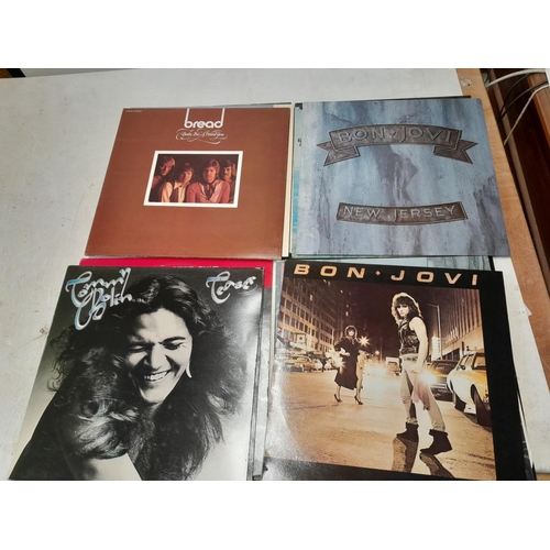 43 - 12 x vinyl record albums : Bon Jovi, Blue Oyster Cult, Blue Oyster Cult, Boxer, Brand X, Tommy Bolin