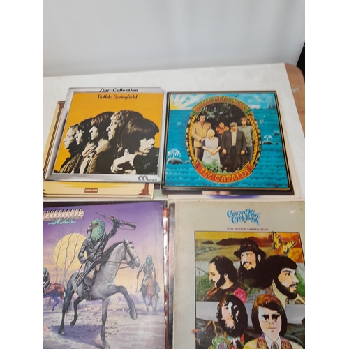 45 - 12 x vinyl record albums : Budgie, Kate Bush, Camel, Jim Capaldi, David Byron