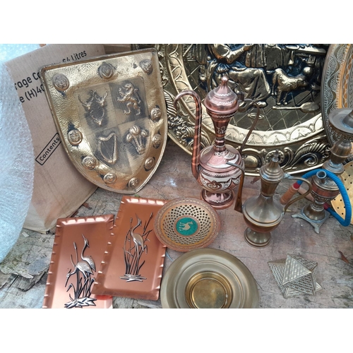 84 - Large array of brassware : Benares table top, wall dish, brass horses etc.