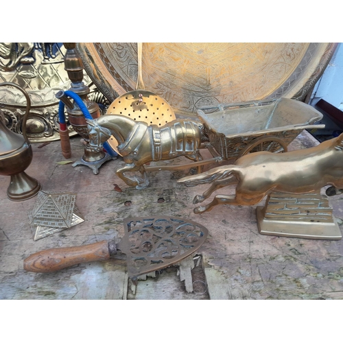 84 - Large array of brassware : Benares table top, wall dish, brass horses etc.