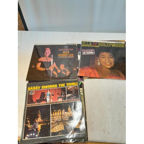 29 - Assorted vinyl record albums : jazz including Ella Fitzgerald, Sarah Vaughn, Dizzy Gillespie & Miles... 