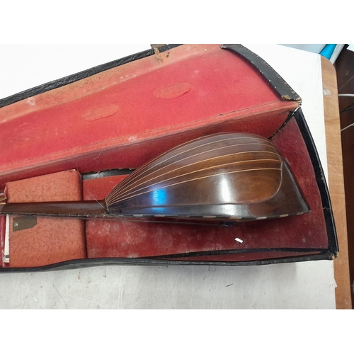 110 - Early 20th century bowl back mandolin  in case Francesco Perretti & Figli, in need of restoration