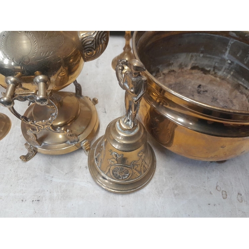 138 - Assorted brassware : candle sticks, bell, tea kettle on stand, Regency style jardiniere etc.