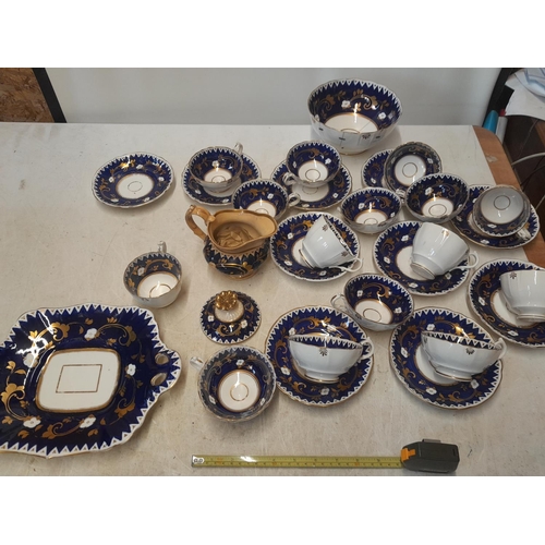 145 - Mid Victorian blue and gilt part tea set with some restoration and damages