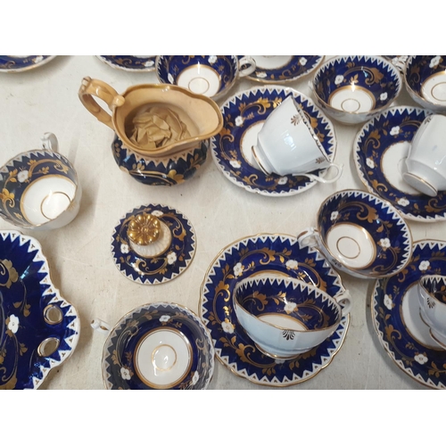 145 - Mid Victorian blue and gilt part tea set with some restoration and damages