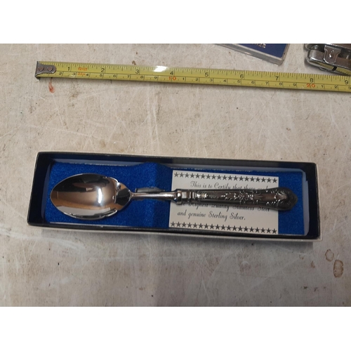 150 - Silver handled boxed tea spoon, table lighters, presentation case of fisheaters , bronze medal etc.