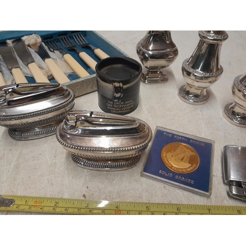 150 - Silver handled boxed tea spoon, table lighters, presentation case of fisheaters , bronze medal etc.