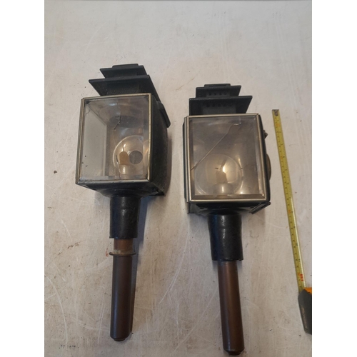 180 - 2 x early 20th century coaching lamps, note cracked lenses