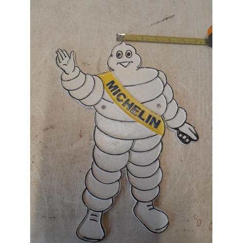 234 - cast iron Michelin Man sign