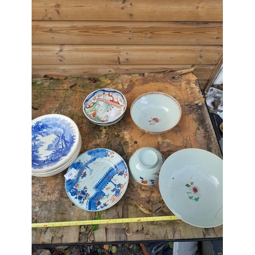 242 - Assorted blue and white bowls and various pieces of 19th century and earlier damaged Chinese pottery... 