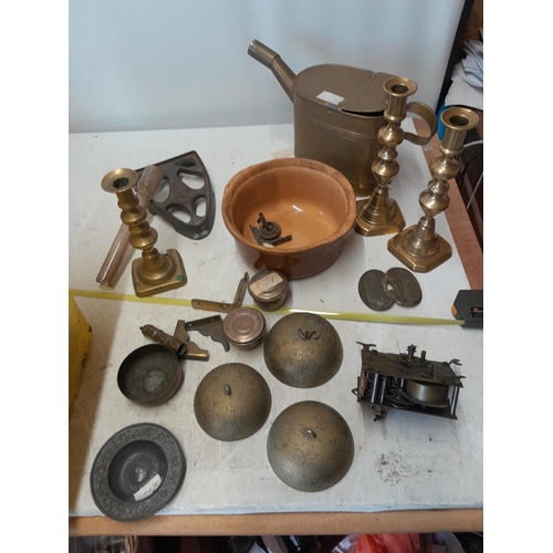 248 - Box of oddments : brass candlesticks, kettle stand, Indian inlaid box, Chinese brass bells etc.