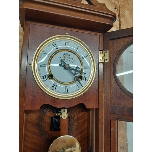 263 - Watts and Sons oak case striking wall clock