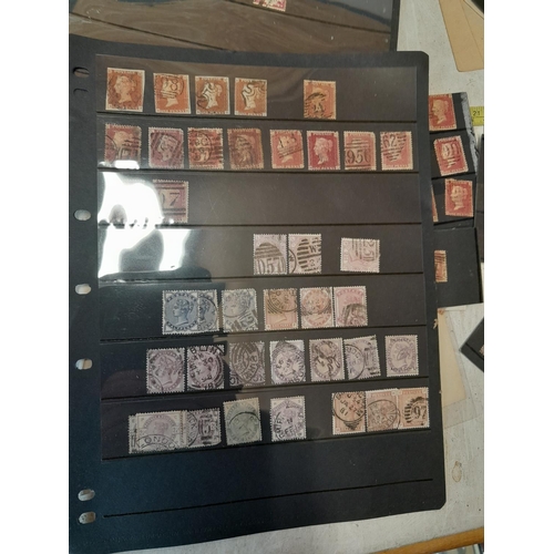 265 - Stamps : used stamps from late Victorian period loosely mounted on sheets, PHQ card and other relate... 