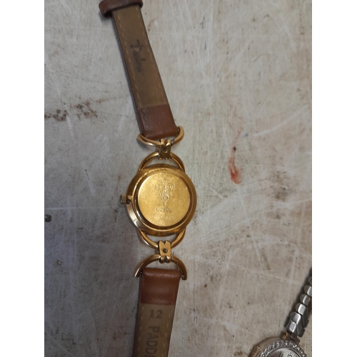 272 - Ladies Gucci wristwatch with scuffed face, leather strap and Avia watch