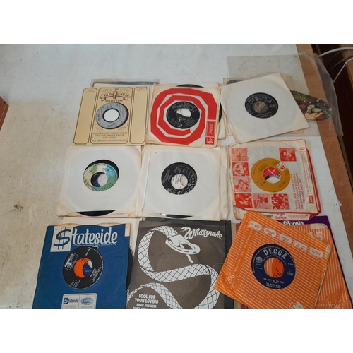 316 - Assorted interesting vinyl record singles, many centres missing, from a private juke box