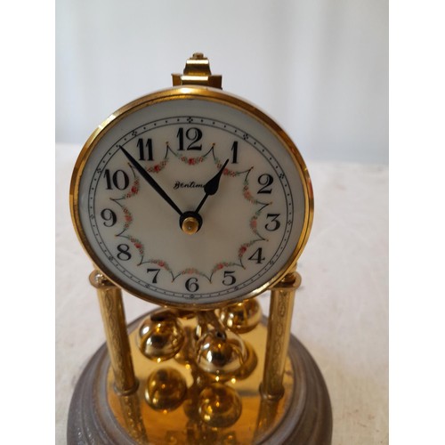 320 - Vintage Bentima perpetual clock in glass dome