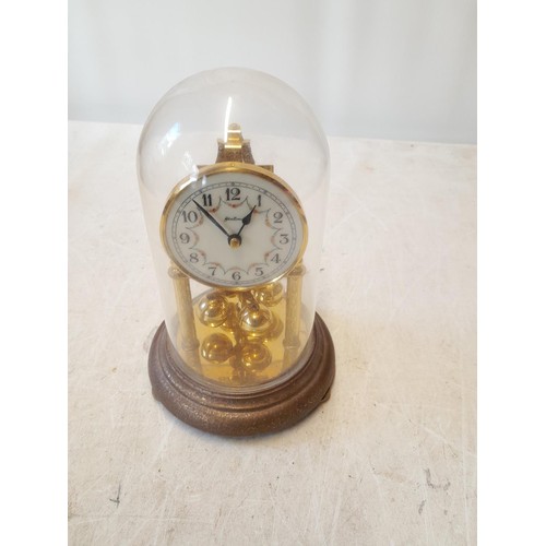 320 - Vintage Bentima perpetual clock in glass dome