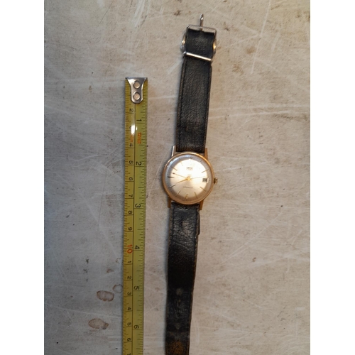 394 - Vintage Smiths gents wristwatch with steel back, leather strap and unmarked  9 ct gold housing