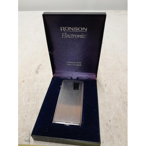 414 - Ronson Electronic pocket lighter in case of issue