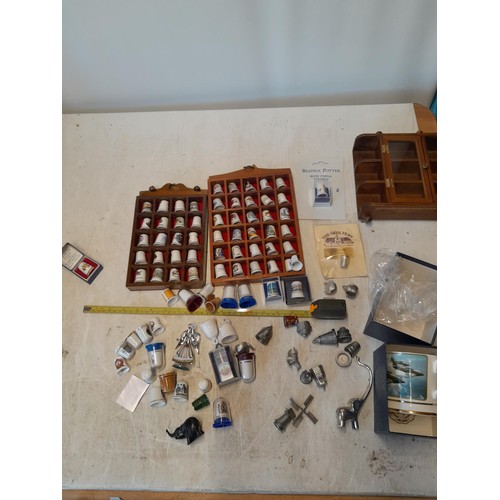 436 - Collection of thimbles, porcelain and pewter