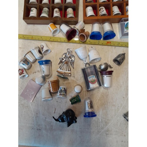 436 - Collection of thimbles, porcelain and pewter