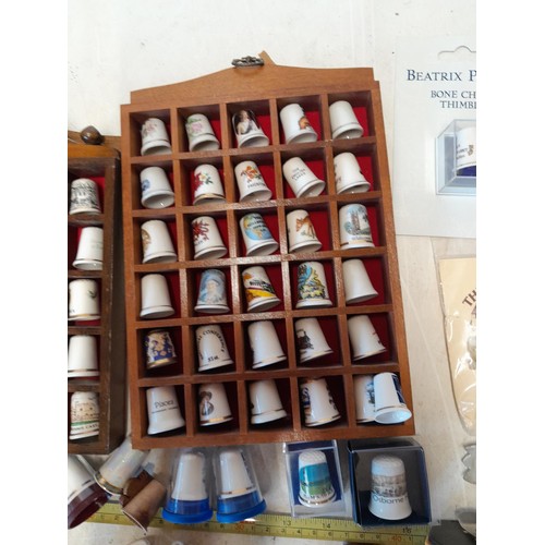 436 - Collection of thimbles, porcelain and pewter