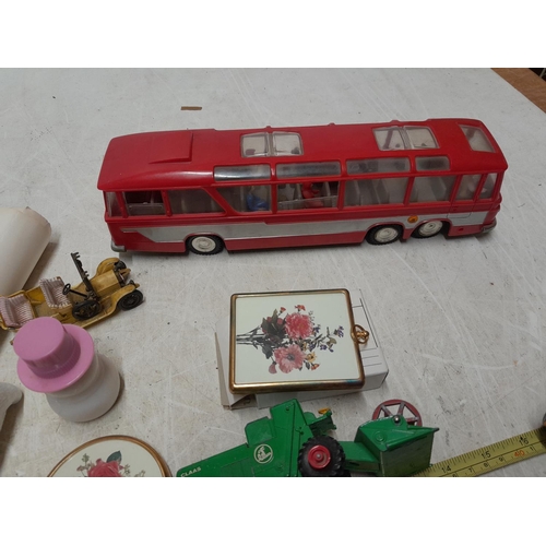 12 - Die cast toy cars , play worn condition, Beatles alarm clock, soaps and perfume bottles etc.