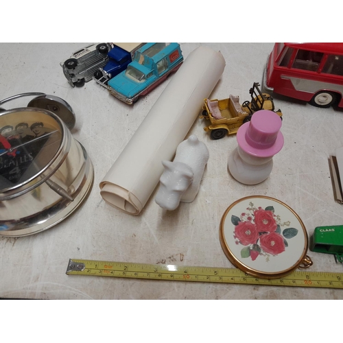 12 - Die cast toy cars , play worn condition, Beatles alarm clock, soaps and perfume bottles etc.