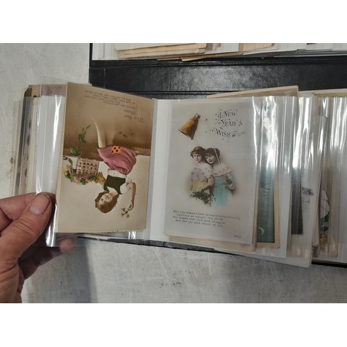 38 - modern photograph album full of early 20th century coloured and black and white postcards, mainly se... 