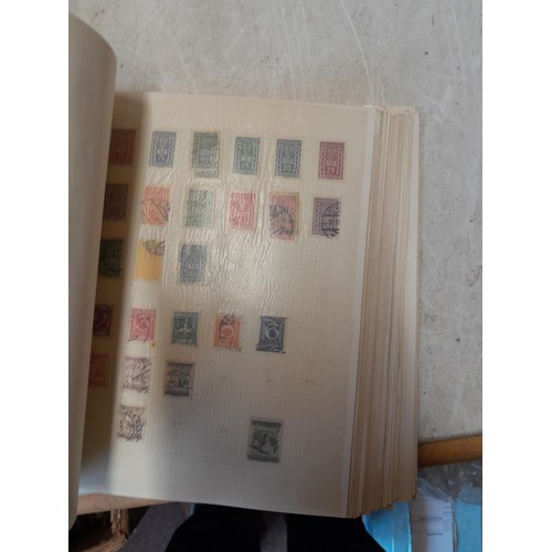 45 - Stamps of the World mounted used and mint in various albums & First Day Stamp Covers