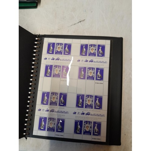 51 - Stamps : QEII stamps mint in stock book, very sparsely filled 25th Anniversary of Coronation of QEII... 