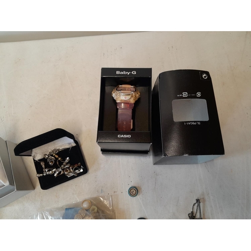 101 - Assorted costume jewellery and oddments : Casio Baby G watch boxed, small amount of silver present