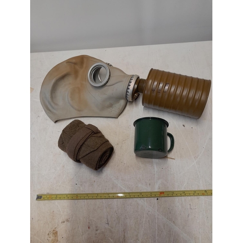 191 - Vintage gas mask, putties and enamel mug