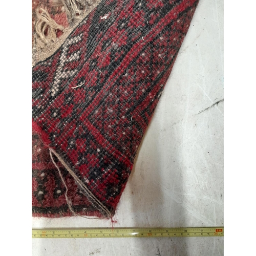 195 - Vintage hand woven Persian woollen mat