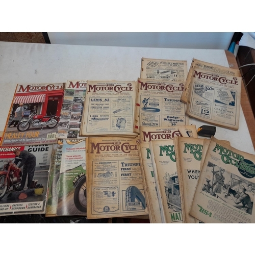 130 - TT Isle of Man racing magazine and other motorbike related ephemera